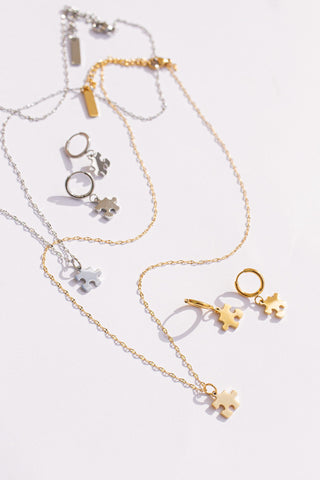 Puzzle Piece Huggie Hoops