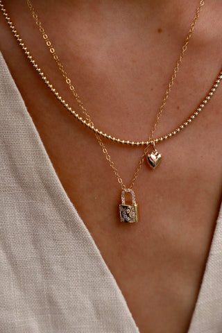 DX CELESTIAL LOCK CHARM NECKLACE